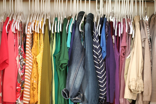 Clothes rack full of colorful clothing