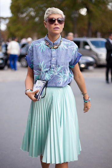 Impact of statement necklace with colorful pleated skirt outfit